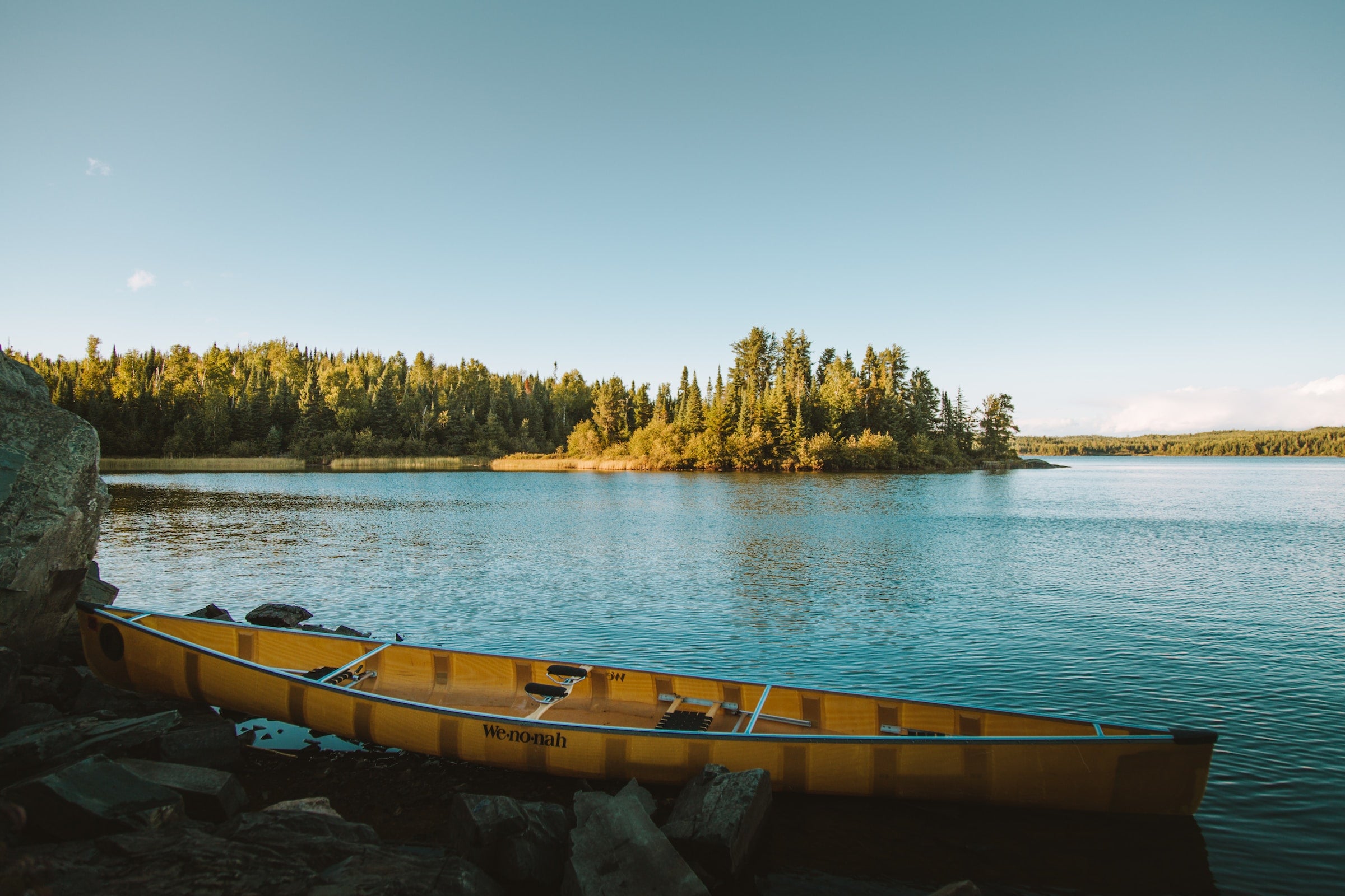 lake with canoe in minnesota