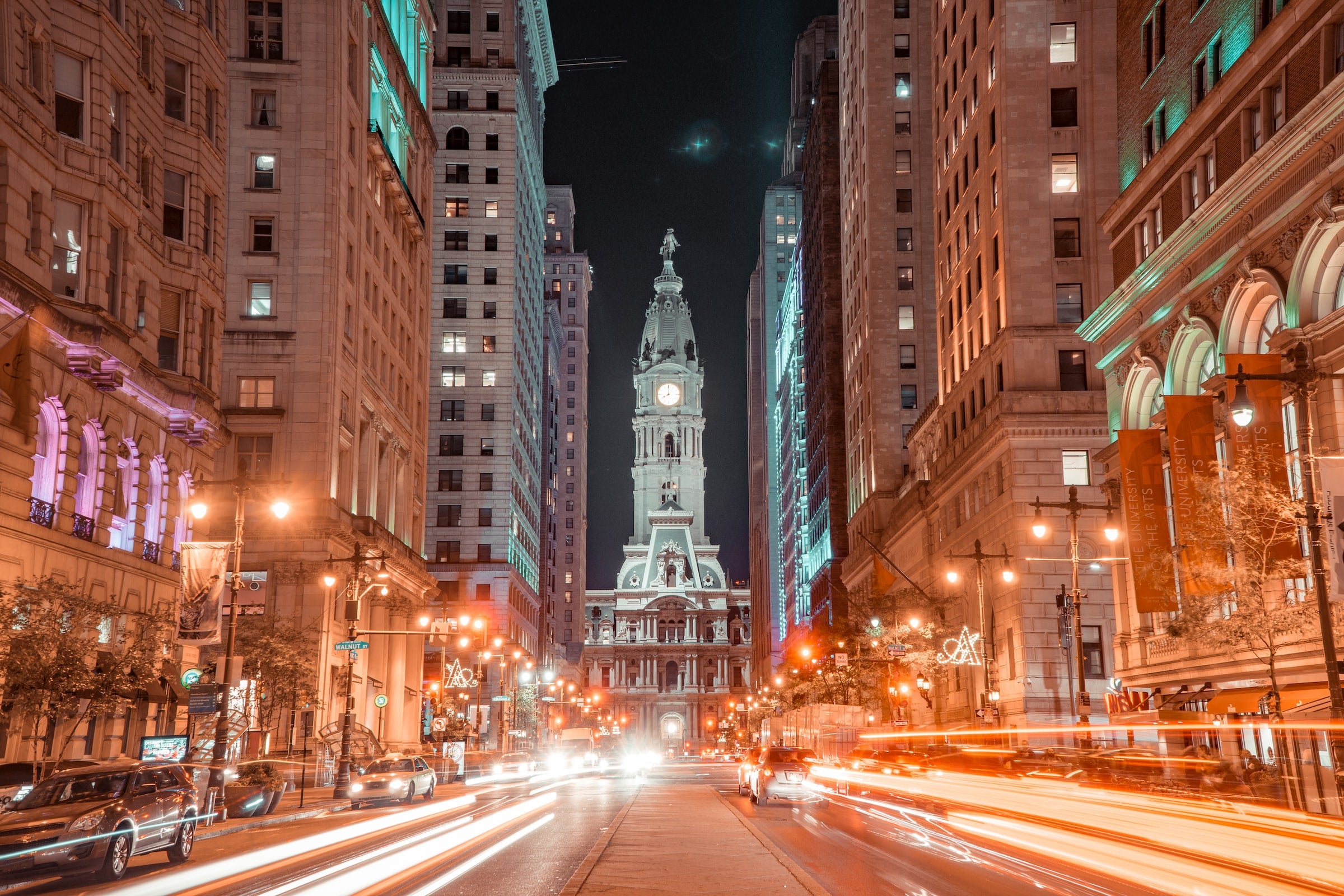 city street with cars at night