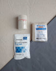 First aid kit refill containing ice pack elastic bandage and triangle bandage