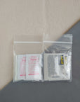 first aid kit restock pack containing ibuprofen diphenhydramine acetaminophen and antacid in baggies