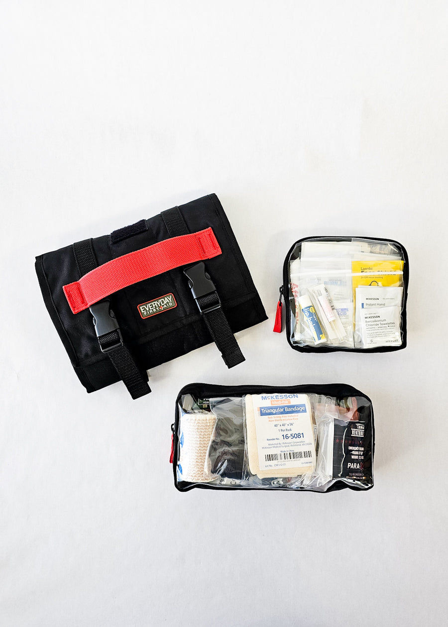 black first aid kit pouches out