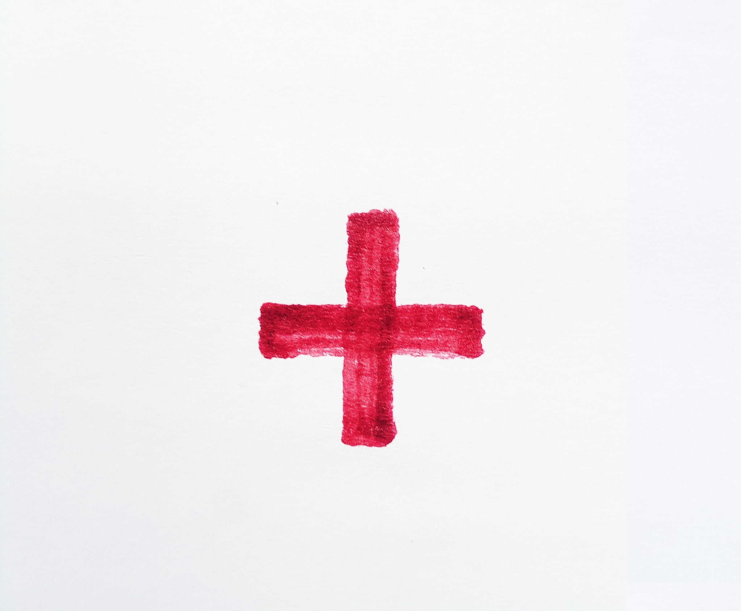 red first aid cross