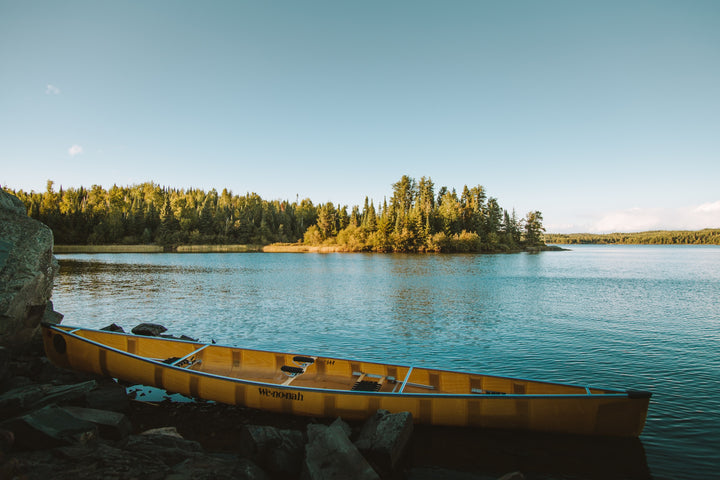 lake with canoe in minnesota