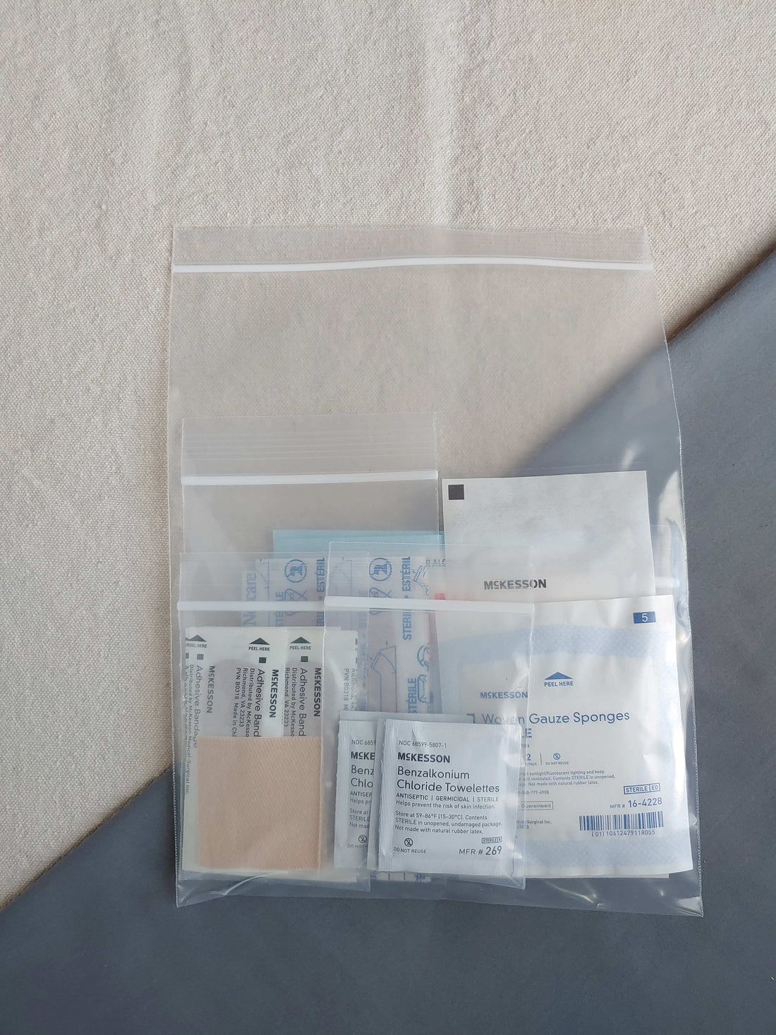 Bandage plus refill pack with bandages BZK wipes and gauze in one baggie