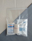 First aid kit refill containing ice pack elastic bandage and triangle bandage in baggie