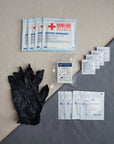 First aid kit dressing refill pack with gauze and nitrile gloves
