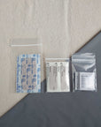 First aid kit bandage refill pack with bandages and BZK wipes in baggies