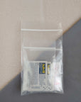 first aid kit restock pack containing ibuprofen diphenhydramine acetaminophen and antacid in baggie