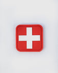 Red and white first aid patch with velcro