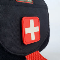 Trauma kit with red and white first aid patch